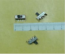 Переключатель движковый (ползунковый) движковый, 3pin, 2 полож., ON-ON без фиксации, 50V  0.5A, под пайку, 13x6x5,5мм, L=5мм, DIP угловой, корпус: ста